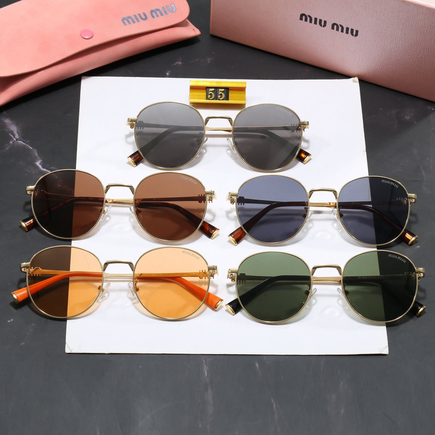 Miu Miu Round Sunglasses