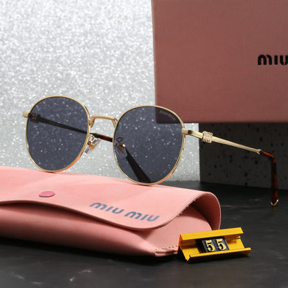 Miu Miu Round Sunglasses