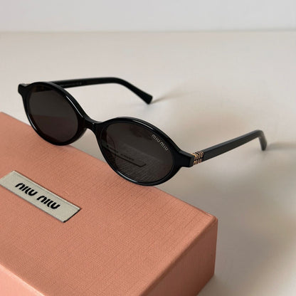 Miu Miu Regard Sunglasses