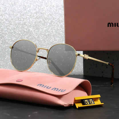 Miu Miu Round Sunglasses