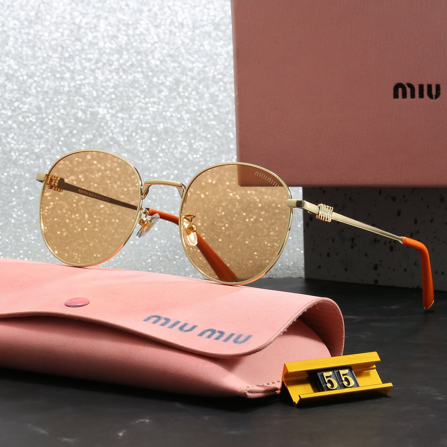 Miu Miu Round Sunglasses